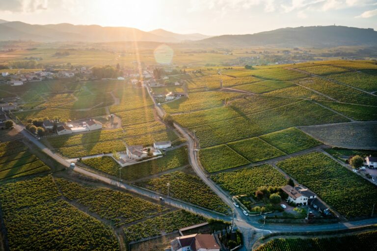 an aerial view of a rural area with a road running through it